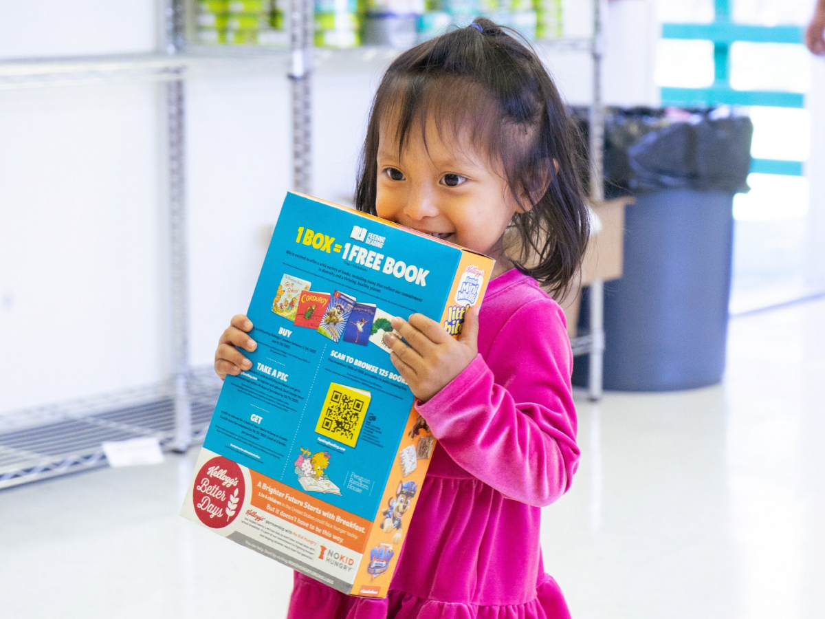 Photo of child holding cereal box
