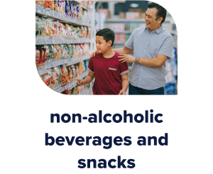 Parent and child shopping the snack aisle in a store