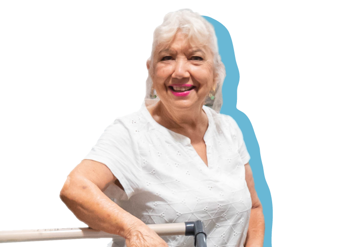 A retired neighbor, Linda, with her arm of the shopping cart, smiling brightly.