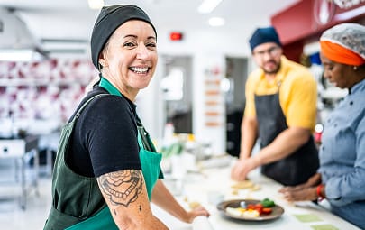 A volunteer serving at a food pantry